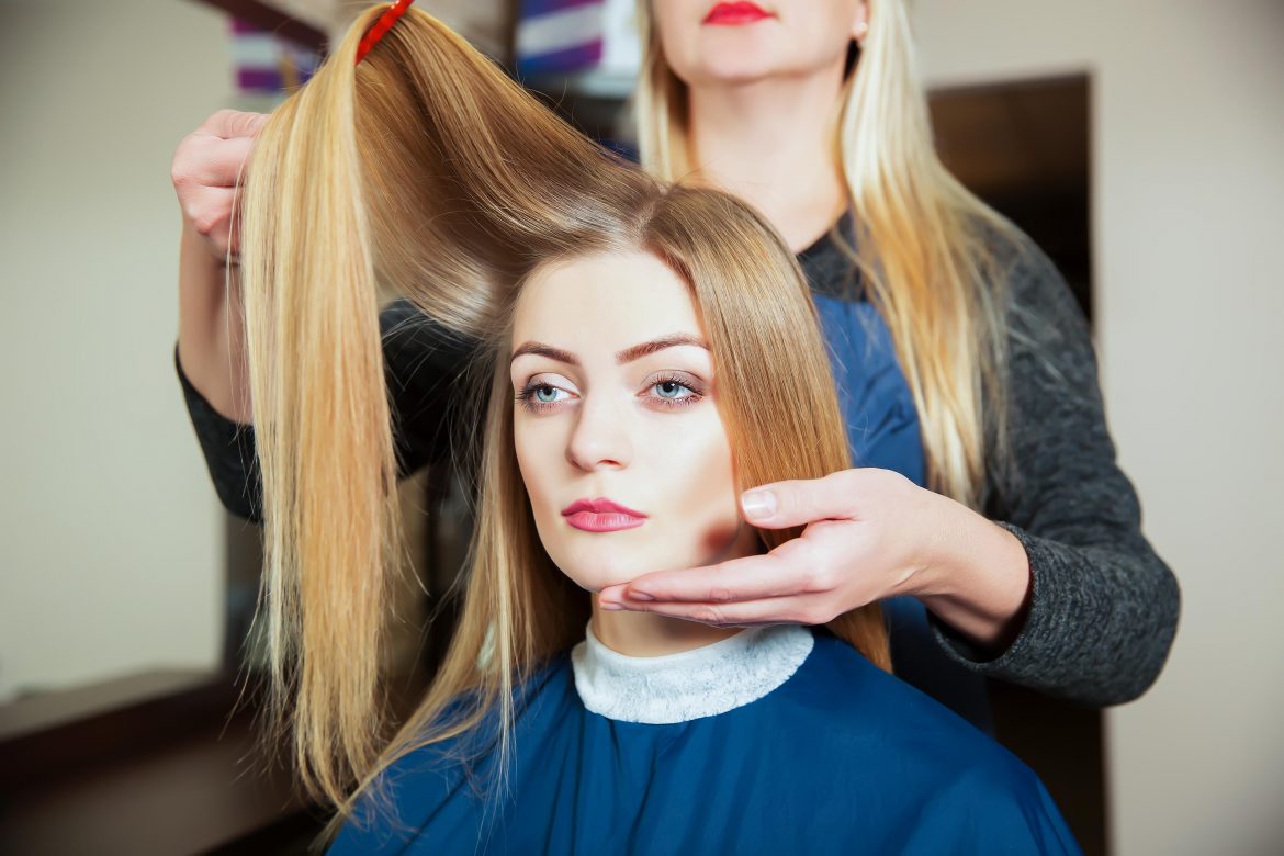 hairdresser-making-hairstyle-with-hairbrush Women’s Hairstyle Trends (2019)